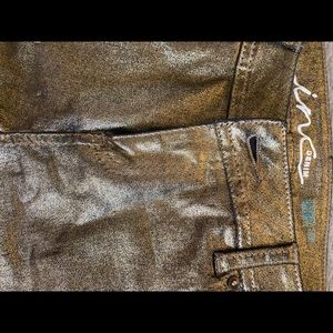 INC gold metallic skinny jeans